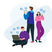 دو مرد و یکزن در حال کار با لپ تاپ و تلفن همراه