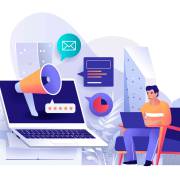 کاراکتری نشسته در کنار لپ تاپ